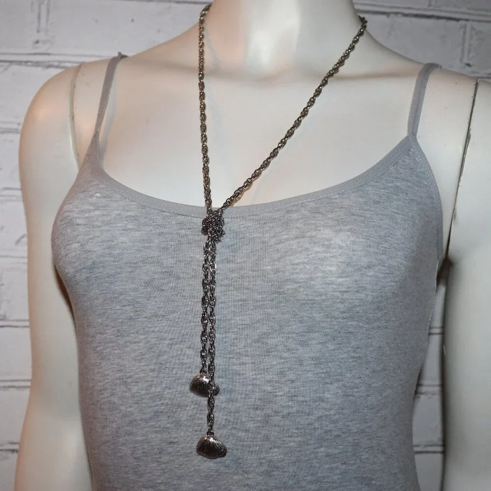 Beautiful vintage tied necklace with shell charms 40
